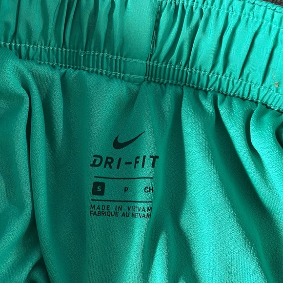 Teal Nike shorts with pink Nike sign and script down right side - Picture 3 of 3